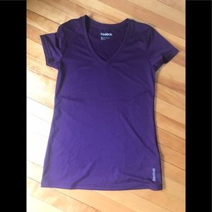 Reebok Women’s XS vneck Purple tech shirt